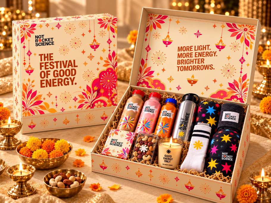 The Festive Good Energy Kit: a colourful Diwali box with energy drinks, socks, a candle and treats